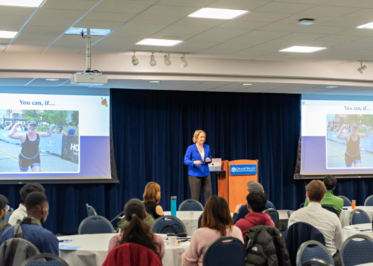 Shaina speaking at GVSU about leadership